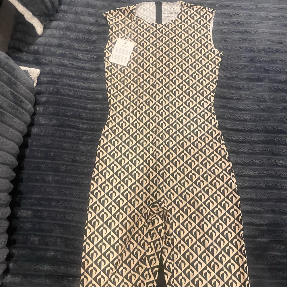 Never worn, medium one piece short marine serre set